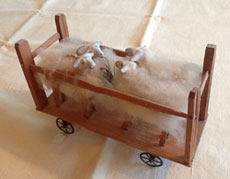 Sheep in Wooden Cart